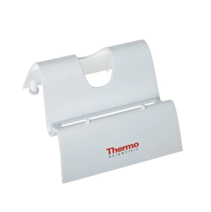 TS 9420390 White plastic Finnpipette Stand for multichannel pipettes, holds 1 pipette, features a curved and grooved design with “Thermo Scientific” in red and gray on the front.