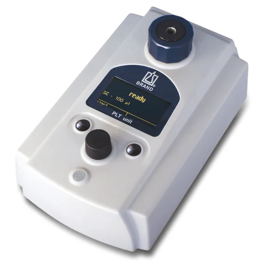 The PLT Pipette Leak Testing Unit with Universal Power Supply (BrandTech) is a compact electronic device with a digital "ready" display, control buttons, and top circular holder—ideal for pipette leak testing on a white background.