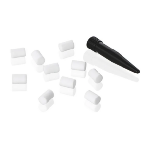A BrandTech PLT Pipette Leak Testing Unit, made of black plastic with a tapered end, is shown beside several small white PE filters and a pipette adapter stopper on a white background.