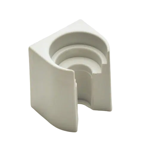 022230905 The Easypet Wall Mountable Holder (Eppendorf) is a white plastic corner protector with a notched, semi-circular groove design, ideal for organizing Eppendorf tubes. Shown on a plain white background.