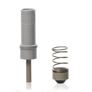 A gray plastic cylindrical piston with seal and a metal spring with round gray base, both upright on white, are parts from the Transferpette Electronic Piston + Seal with Spring, Single Channel, 10-200μL (BrandTech).