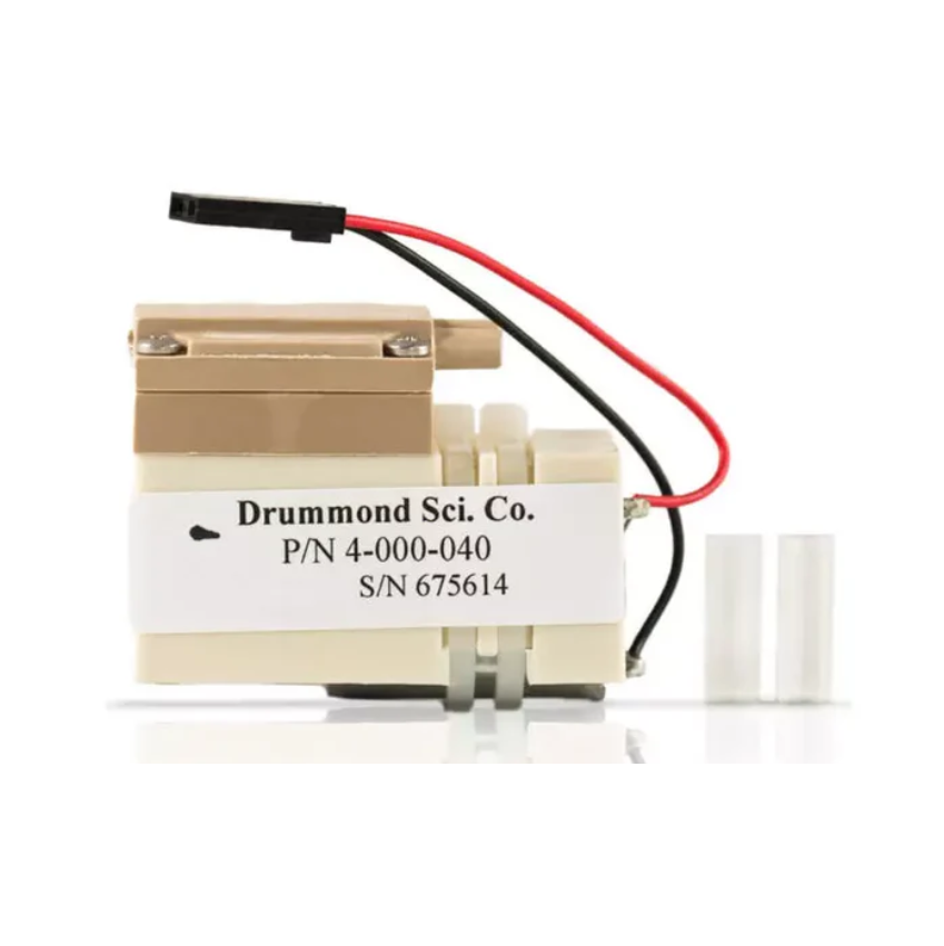 DR 4-000-040_ A Drummond Portable Pipet-Aid XP Motor & Pump (P/N 4-000-040 S/N 675614) with attached wires and two clear plastic tubes is shown on a white background.