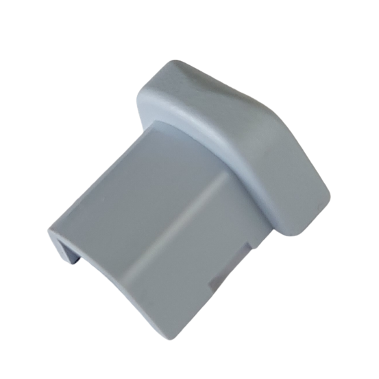 NI 5G2-033B A gray, plastic, rectangular component with a sloped top and open bottom, designed as a protective cover or cap for the Nichiryo / Oxford Benchmate I Ejector Button (Nichiryo).