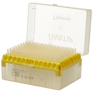 A yellow Finntip Filter 100 Rack (0.5-100µL, sterile, filtered, 10 x 96 tips) by Thermo Scientific, with a transparent hinged lid partially open, holds multiple pipette tips for laboratory liquid handling.