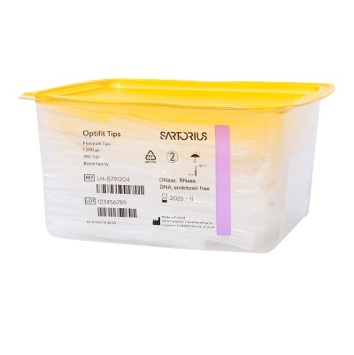 A plastic container with a light purple lid labeled Optifit FlexiBulk Tips, 50-1200μL, 71.5mm (480 count), Sartorius, with product and lot info on the front.