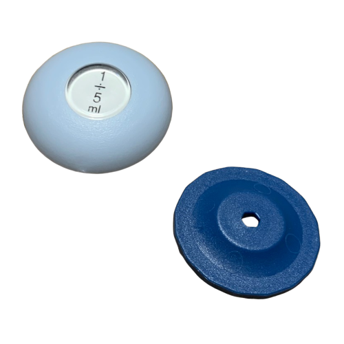 A round blue object and a light blue VWR EHP Signature Push Button Assembly, 1-5mL, 5000μL (Labnet), with its label visible inside a small window.