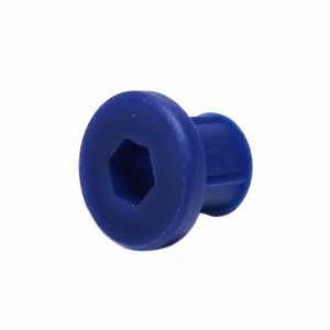 A blue Microman Locking Cap by Gilson, featuring a wide round head with a central hexagonal recess, made of plastic.
