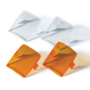 Titrette Inspection Windows by BrandTech—two clear, two amber—arranged in pairs on a white background.