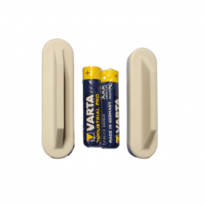 Two Titrette Micro Batteries with Case Covers, 1.5V, 2 Pack (BrandTech), are standing upright between two white rectangular plastic holders featuring angled notches.