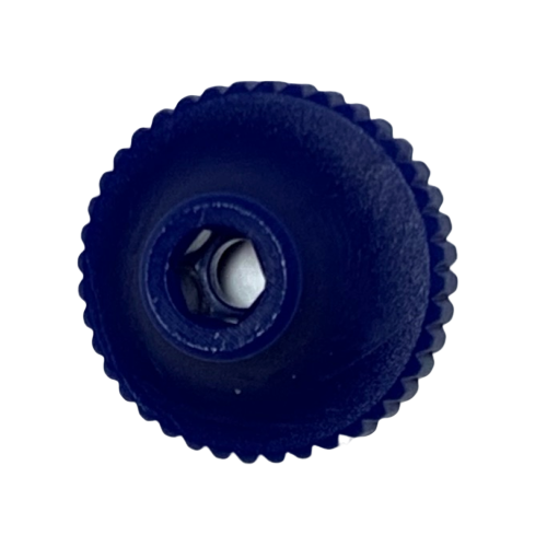 148626slash1 A dark blue, round, ridged plastic Microman Adjusting Knob (Gilson) with a central hole and a smaller off-center hole is shown on a white background.