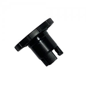 Distriman Black Adjustment Ring (Gilson): black plastic component with a ridged circular top and cylindrical base, featuring notches and slots, isolated on a white background.