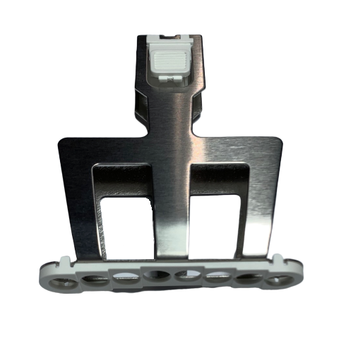 F807137 A metallic surgical implant with rectangular cutouts, a white plastic clip at the top, and a row of six holes at the base, resembling the Pipetman M Tip Ejector Assembly, Multichannel, 8 Channel, 1200μL, P8x1200M (Gilson).