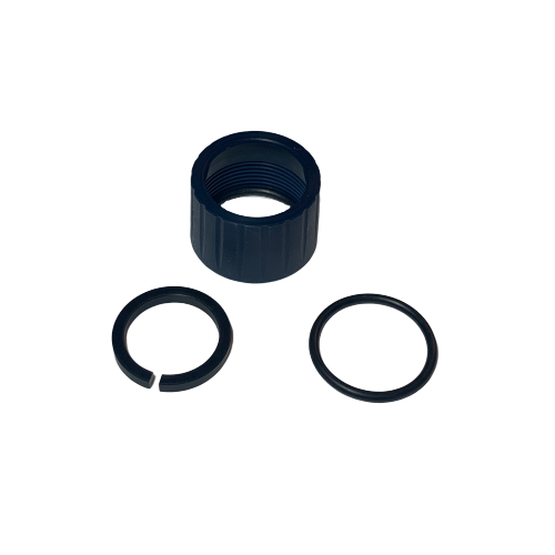 GI F807101 Displayed on a white background are components from the Pipetman M Multichannel, Connecting Nut and Washer Set (Gilson): a black threaded plastic cap, a split ring, and a solid O-ring gasket.