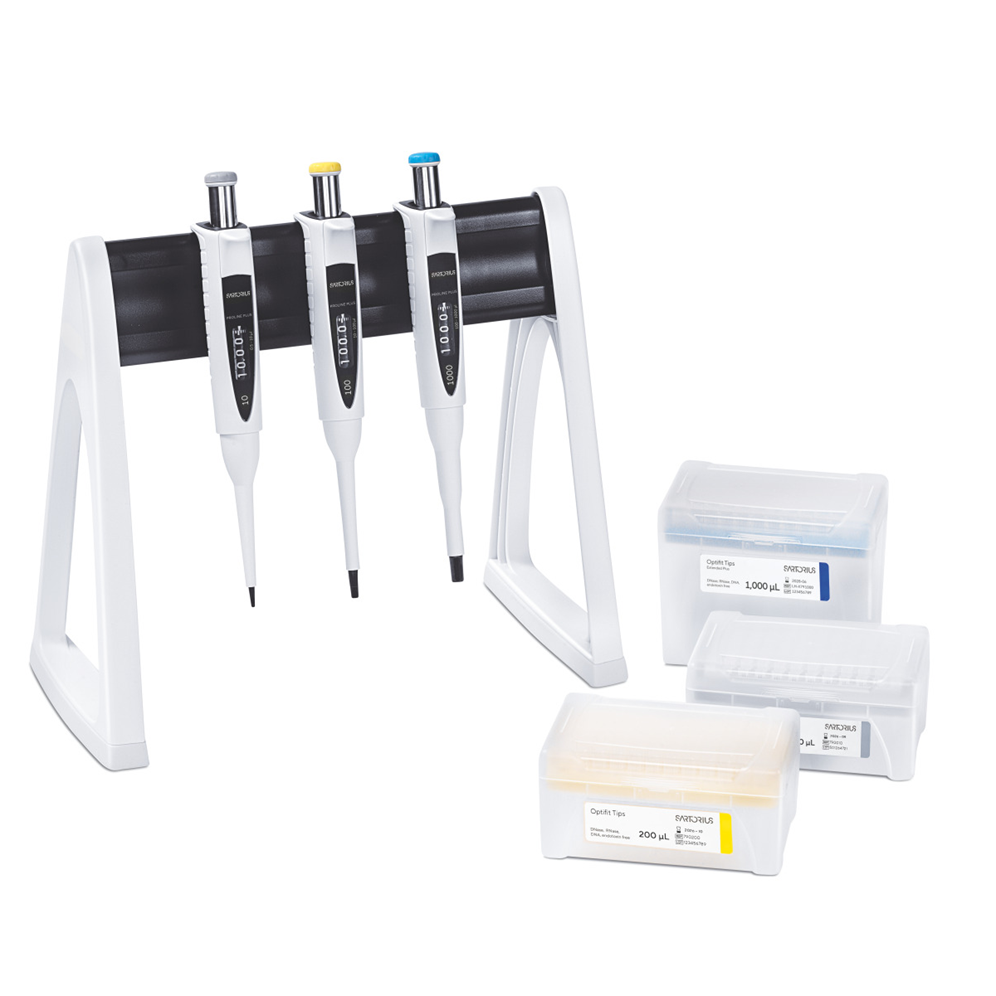 Three Sartorius Proline Plus mechanical pipettes (0.5–10μL, 10–100μL, 100–1000μL) in a stand, next to yellow, blue, and clear pipette tip boxes