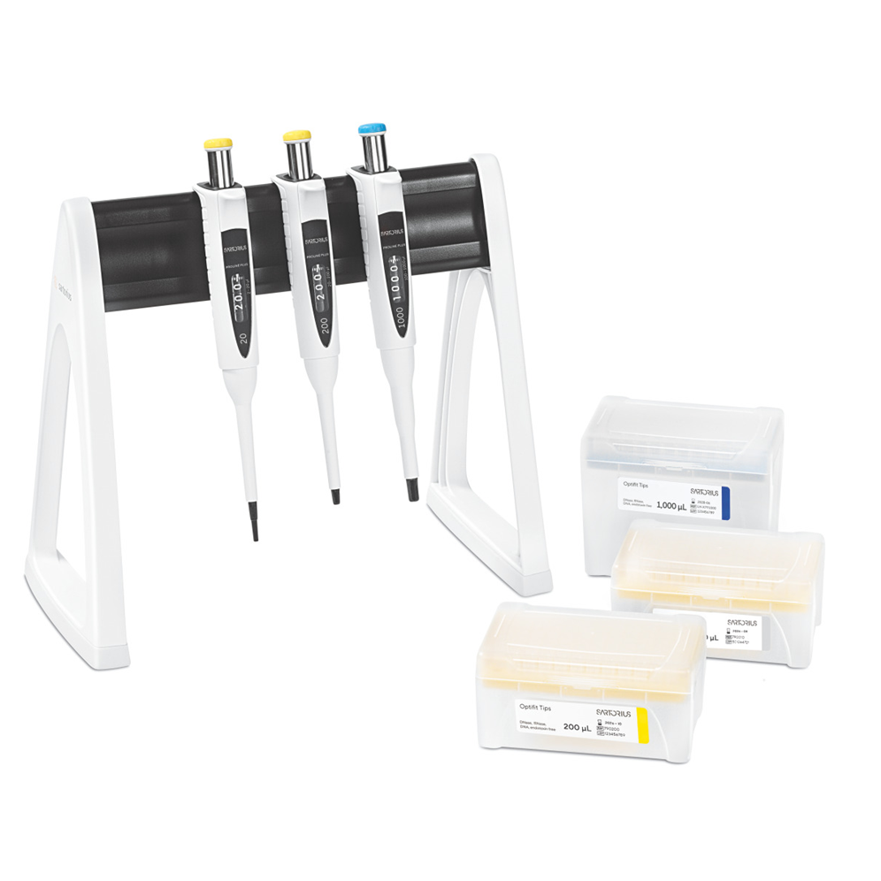 A Sartorius Proline Plus Mechanical Pipette 3-Pack with adjustable volumes (2-20μL, 20-200μL, 100-1000μL) rests on a stand beside four pipette tip boxes, each clearly labeled with volume and quantity details.