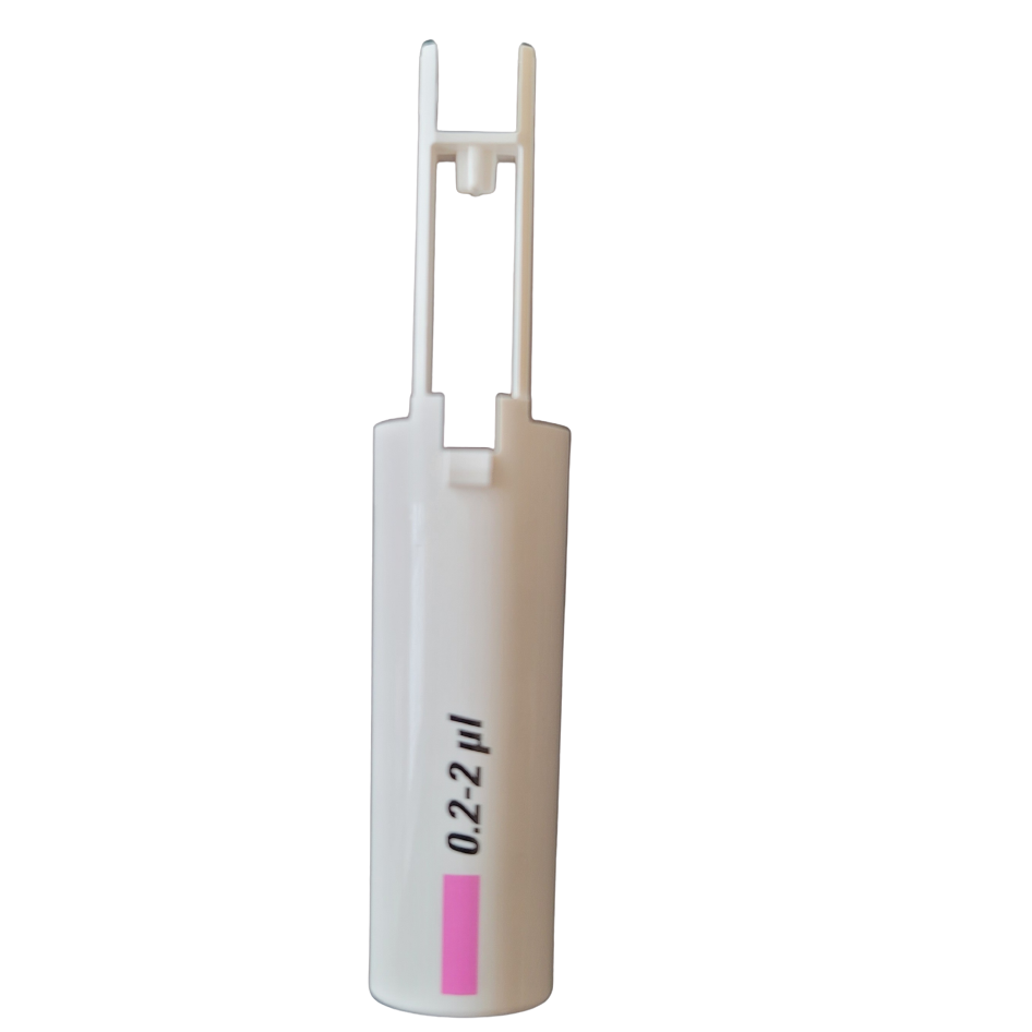 The Finnpipette F1 Upgrade Tip Ejector Pusher Lower Part, 2μL (Thermo Scientific), is a white plastic pipette tip with a pink mark and 0.2-2.2 µl printed in black, shown upright against a white background.