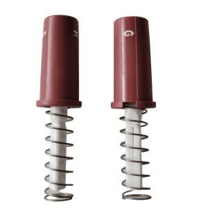 Two burgundy Button Assembly springs for the Portable Pipet-Aid XP Gravity Drain by Drummond stand upright on a white background, with extended springs and visible plastic plungers, reflecting the device's precision engineering.