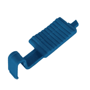 The Pipet-Aid XPress Nosepiece Release, Blue (Drummond), is a blue plastic clip with a ridged surface and hook, designed for securing or fastening objects.