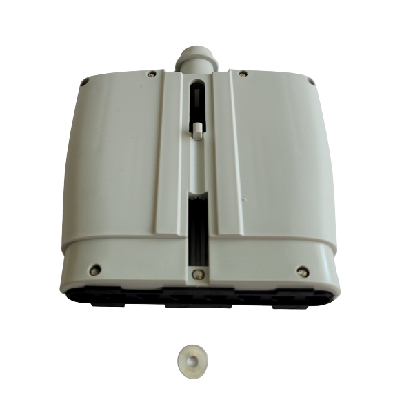 A white plastic rectangular housing with a central slot, similar to the Lambda EliteTouch Manifold Housing Set, 8 Channel (Labnet), and a small detached round component positioned below it.