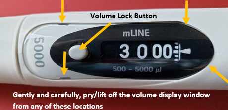 Volume display window, volume lock window. Gently and carefully pry/lift off the volume display window from any of these locations.