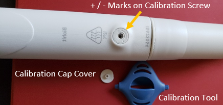 Once cap is removed, calibration screw is revealed