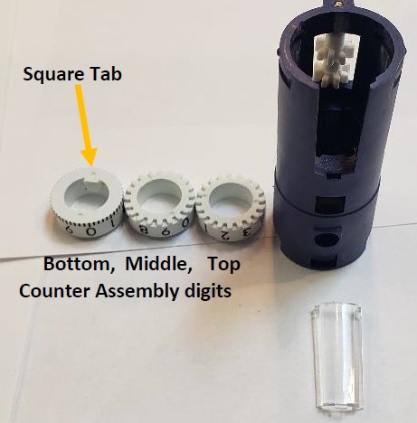disassembled body and counter wheels. Pipet-Lite Counter Assembly