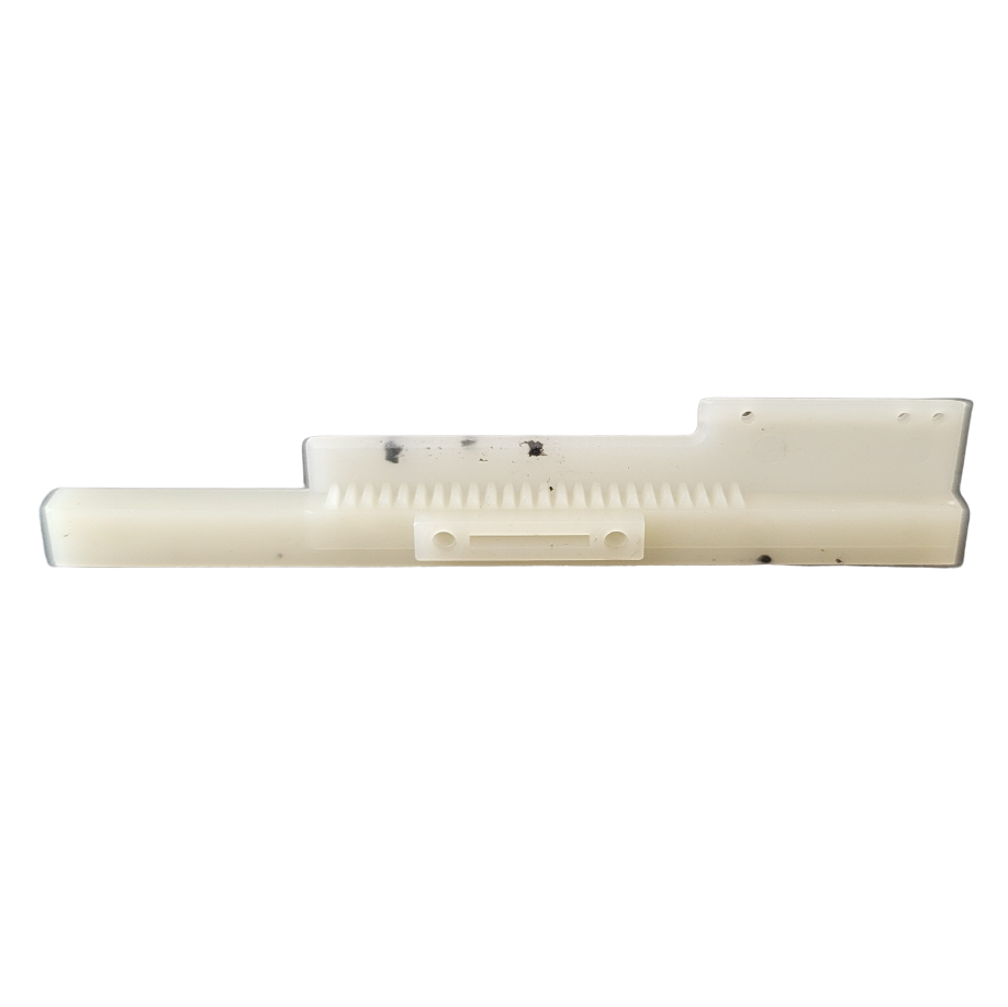 The E1 ClipTip Pinion Rack Upper (Thermo Scientific) is a white plastic component with evenly spaced teeth, small black spots, and mounting holes, shown on a white background. Compatible with Thermo Scientific E1 ClipTip systems.