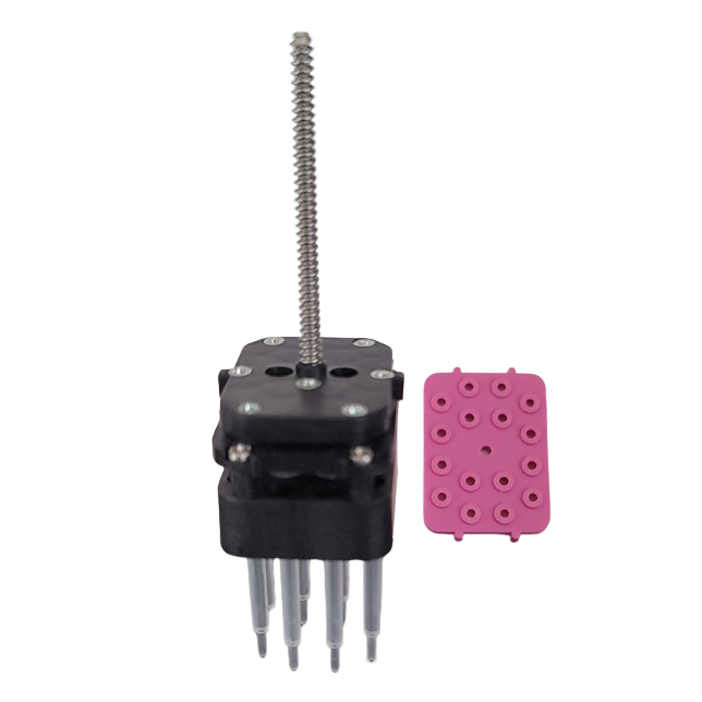 A black and silver mechanical part with a vertical rod and five metal pins beside a pink silicone piece with round indents resembles the Thermo Scientific E1 ClipTip Cylinder Block, Multichannel, 8 Channel, 30μL accessory.