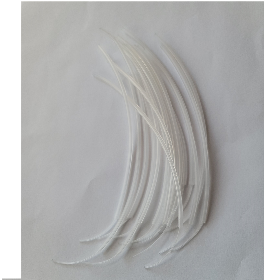 A group of translucent, curved plastic rods—similar to the E1 ClipTip Tube Set, Multichannel, 16 Pieces, 12.5μL - 30μL (Thermo Scientific)—arranged on a plain white surface.