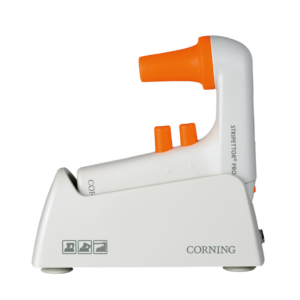 A Corning Stripettor Pro Pipet Controller with Charging Stand (Corning Life Sciences) in white and orange is shown from the side.