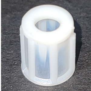 A close-up of a white, ridged Rainin Classic Small Spring Positioner (2µL–200µL) is shown on a dark surface.