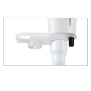 Close-up of the Nichiryo Tube Opener, 3 Pieces (Nichiryo), a white plastic laboratory accessory with a circular slot, shown attached to a pipette and serving as both a tube opener and pipette holder.