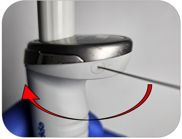 turning adjustment cap to release