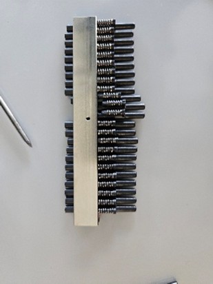 Eppendorf Research Plus multichannel nose cones being prepared for replacement.